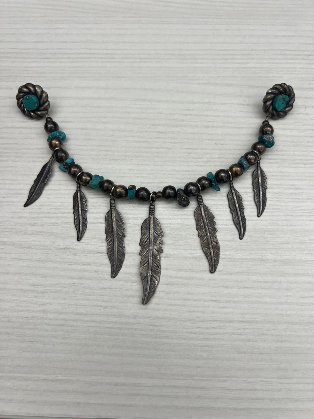 Mid 20th Century Native American Navajo Feather and Turquoise Sterling Silver